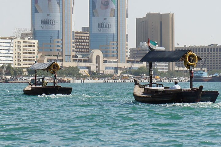Experience the charm of Old Dubai as you glide through the water on traditional Abras soaking in the unique blend of history and modernity that defines this vibrant city.